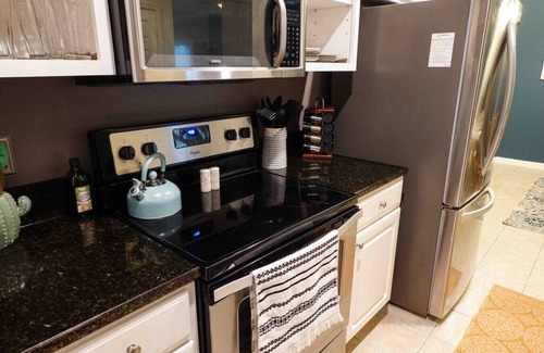 Rehoboth Beach Condo | Boho Rehoboth condo-2bd/3.6mi to Beebe/.5mi outlets/walk to coffee!