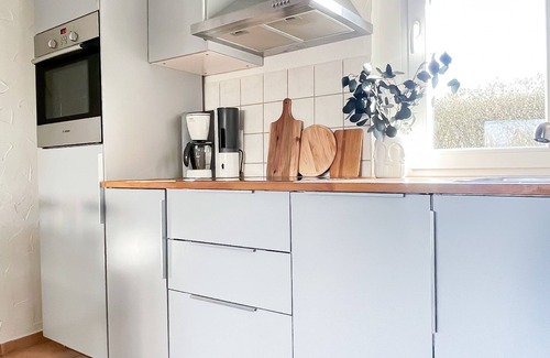 Kirchdorf House | Boho-style bungalow on a natural beach.