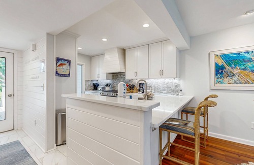 Spinnaker Beachhouses Villa | Bold villa with grill, outdoor shower & deck - by beach and Camp St. Christopher