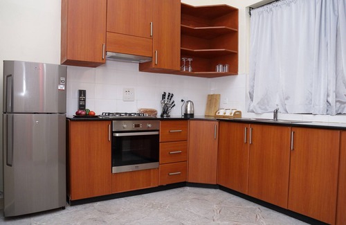 Kireka Apartment | Bon Bini Residence - Deluxe - 3 Bedroom Apartment - Pool Viewn