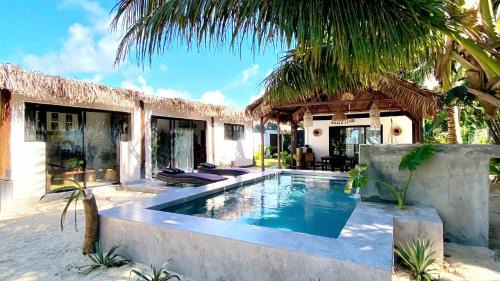 Nosy Boraha Villa | BORAHA BEACH LODGE lodge de plage avec PISCINE PRIVEE, cuisine, salon, télévision, wifi, coffre, ménage, gardien