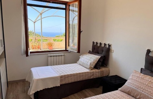 Magomadas Apartment | Bosa Apartment large terrace with a view