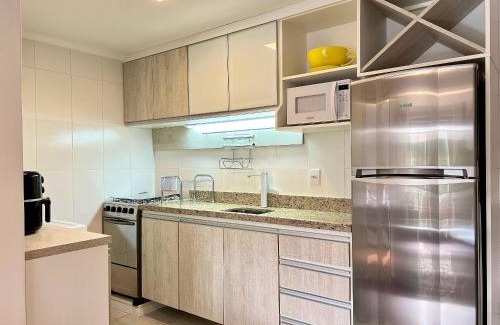 Tres Pinheiros Apartment | Bosque das Azaléias 1 dorm by Achei Gramado