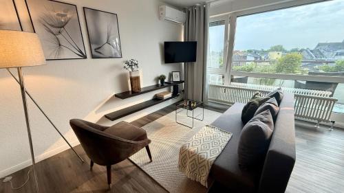 Moers Apartment | BOSTEL 89 - Moderne Stadtwohnung in Moers mit Klimaanlage