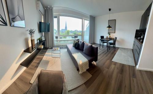 Moers Apartment | BOSTEL 89 - Moderne Stadtwohnung in Moers mit Klimaanlage