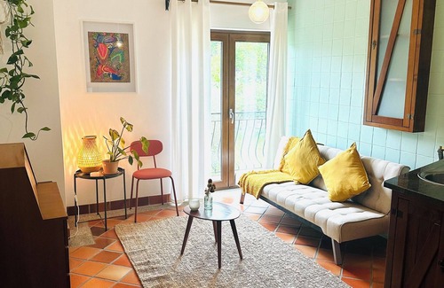 Oliveira do Hospital Apartment | Botanical Balcony Nest