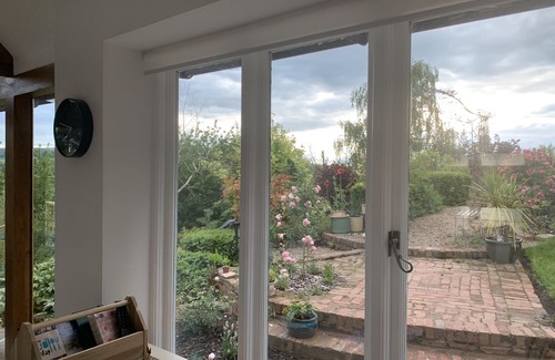 Ludlow Cottage | Boutique garden apartment with decking and views