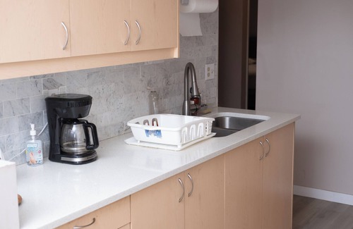 Sunnyside House | Bow River Retreat: Basement Room for Rent