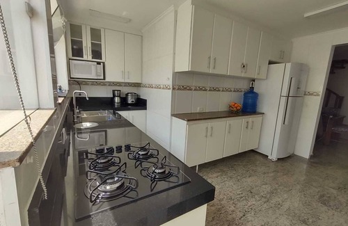 Balneario Praia do Pernambuco House | House 4 suites - Pool/BBQ, Wi-Fi, AIR COND near Pernambuco Beach