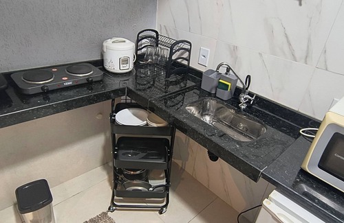 Sao Pedro da Aldeia Apartment | Suite with Air Conditioning and Kitchen| Practicality and Comfort in São Pedro da Aldeia