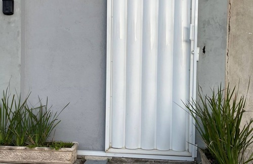 Sao Pedro da Aldeia Apartment | Suite with Air Conditioning and Kitchen| Practicality and Comfort in São Pedro da Aldeia