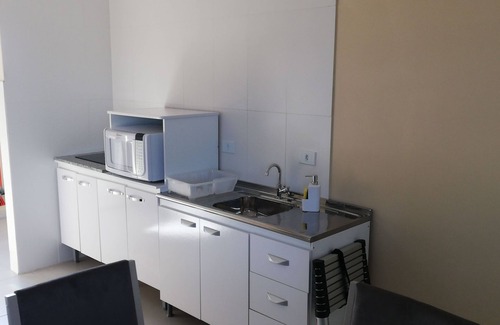 Praia da Armacao do Itapocoroi Apartment | Full Fit with Kitchen in the beautiful Central Beach Armação (ap 02)