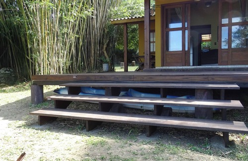 Florianopolis House | Delightful house on land with 5 beaches! Feet in the sand and peace!