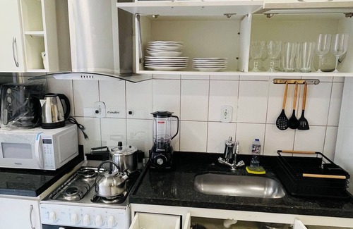 Santos Dumont Apartment | Apartment with queen bed, smart TV, garage, air and Wi-Fi. Pets allowed