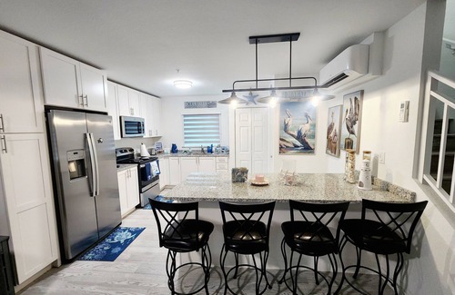 Little Venice Condo | Brand new 1 bedroom, 2 bath condo with waterfront pool & stunning views.