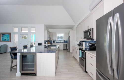 Governor's Harbour House | Brand New 10-BR Beachfront Compound w/Pool on Bank