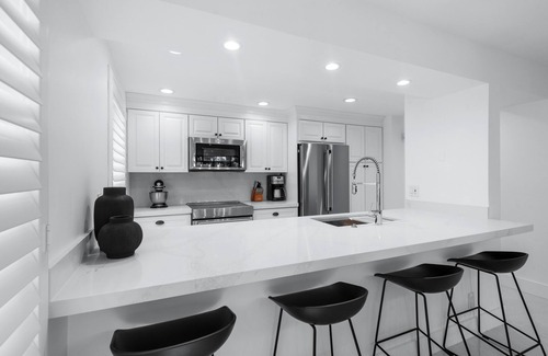 Hunt Club Condo | Brand New 2024 Home on PGA National Golf Course by Guaranteed Rental™