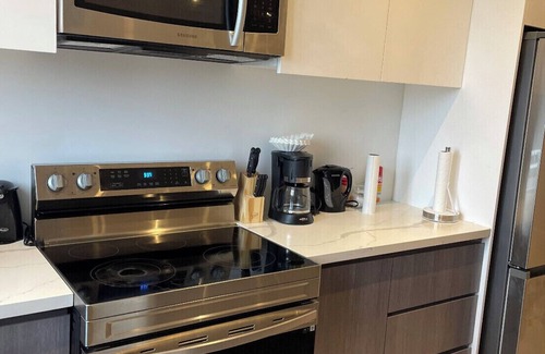 Nassau Condo | BRAND NEW 3 Bedroom luxury Condominium- 5 mins away from the beach! #1 spot!