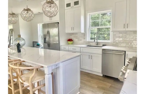 Hague House | Brand New 3 story river house with rooftop deck.