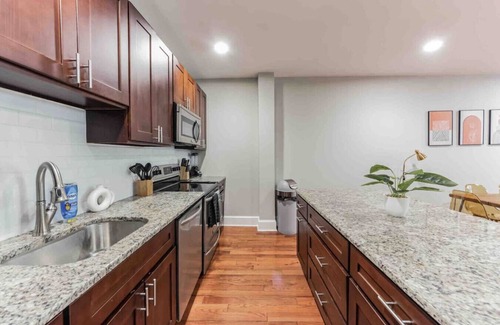 Midtown Village Apartment | BRAND NEW 4/4 Center City w/Roof PATIO Sleeps 20