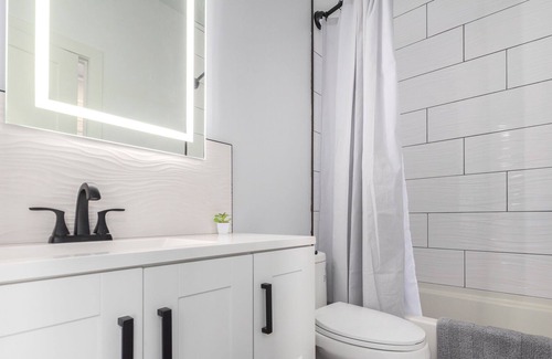 North Gateway House | Brand New Basement Home on a Tranquil Hillside Lot.
