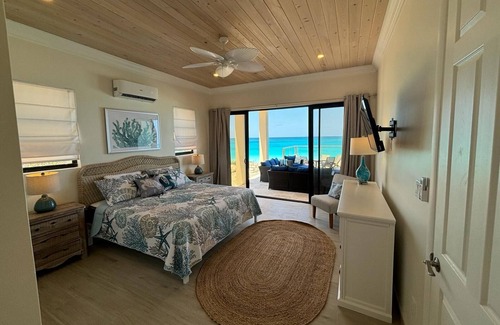 Farmer's Hill Villa | BRAND NEW! Breathtaking Beachfront Palm Grove Villa: Beach, Pool, Spa, Palms!