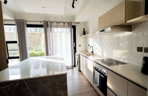 Kigali Apartment | Brand - New & Bright: Gated Courtyard!