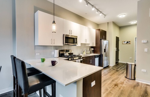 West Town Apartment | Brand-New Building! Secure and Stylish - Great River West Location! by AllSet Turnover