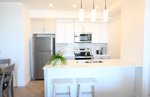 Springbank Hill Apartment | Brand new condo w/fantastic view at west 17 Ave