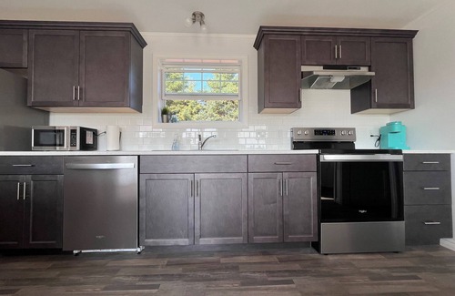 Tryon Cottage | BRAND NEW! Cozy Island beach get-away.