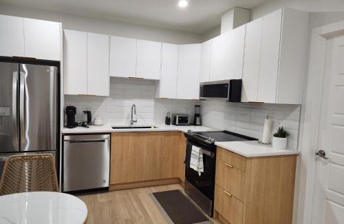 Southeast Calgary Apartment | Brand New Deluxe 2 Bedroom Suite with AC & Den
