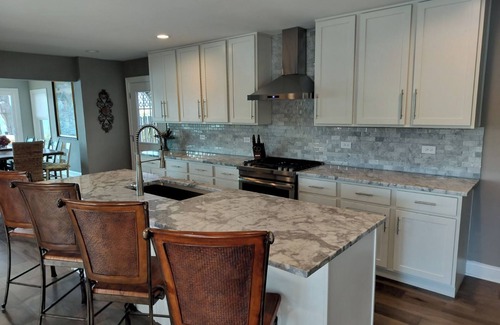 Round Lake House | Brand new from the studs to the pillows! The Lakeshore House.