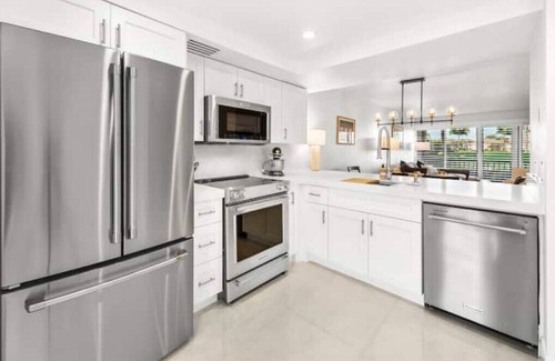 Hunt Club House | Brand New Home at PGA National on Championship Golf Course by Guaranteed Rental™