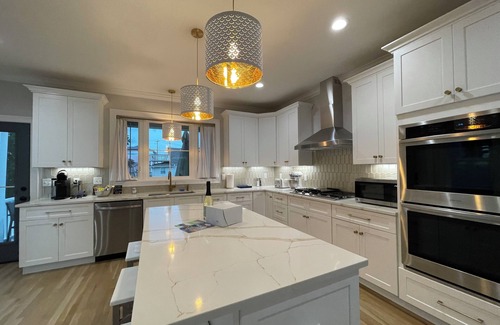 Devon House | Brand new house with water views just steps from beach!