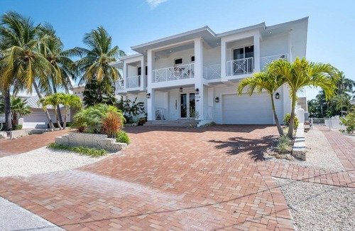 Coury House | Brand new luxury home with private pool & dock