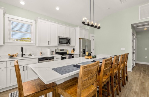 Corolla Village Condo | Brand-New Luxury Condo, Steps to the Beach and Heated Neighborhood Pool!