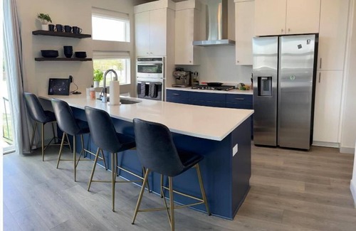 Sandy House | Brand New modern 3 story home with fenced in yard! Outdoor hot tub and firepit