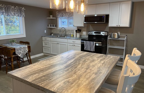 Wilsons Beach Apartment | Brand New Oceanfront Sunset Suite in Wilson’s Beach