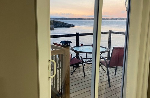 Wilsons Beach Apartment | Brand New Oceanfront Sunset Suite in Wilson’s Beach