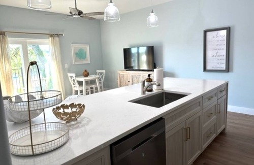 Tropic House | Brand new riverfront luxurious townhome with Interior designer finishes.