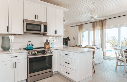 William's Town Villa | BRAND NEW* Silver Palms Retreat, Heated POOL, Deck Oasis,Tropic of Cancer Beach