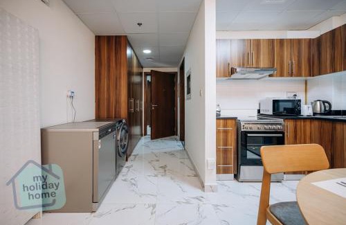 Al Hamra Village Apartment | Brand New Studio Canal View