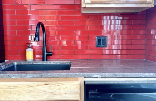 Oskaloosa Condo | Brand New Stylish Condo near Trails & Downtown