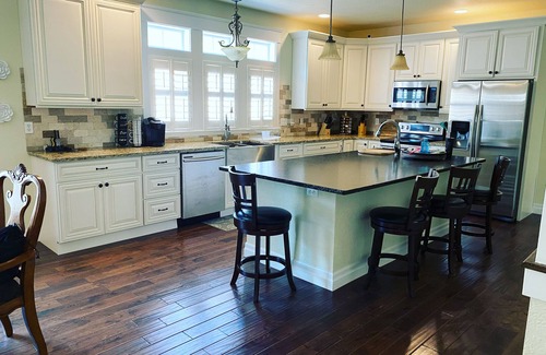 Grants Pass House | Breathtaking home with private historic bridge on a charming creek