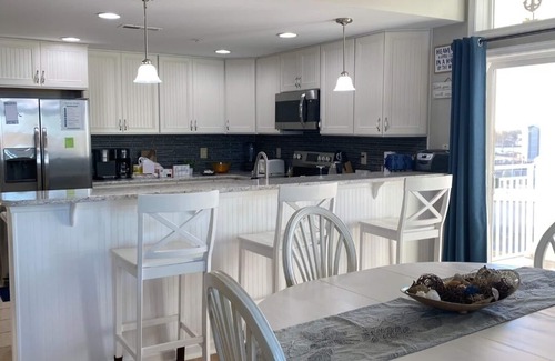 Crisfield Condo | Breathtaking Penthouse Waterfront Condo with Wrap Around Balcony and Boat Slip