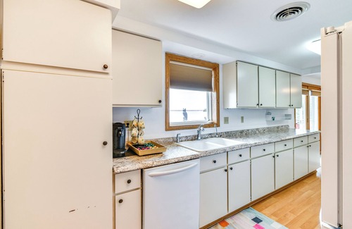Alpena Cottage | Breathtaking Sunsets: Lake Huron Beachfront Escape