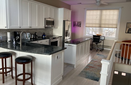 Pipes Cove Condo | Breathtaking Waterfront Greenport Village Condo, private beach, pool, tennis
