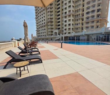 Al Hamra Village Apartment | Breeze Studio & Golf view, pool, gym & identity renew