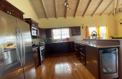 Saint John Parish House | Breezy hillside executive house with great views near to St. Johns City