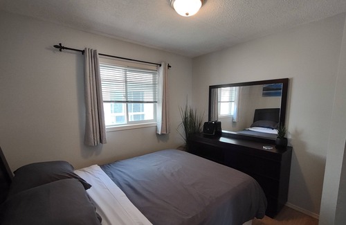 Grande Prairie House | Bright 2 Bedroom Upstairs Suite - Fully Stocked, Clean & Pet-Friendly!
